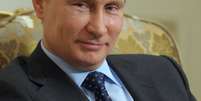 <p>Putin bateu no final de março um novo recorde de popularidade com a anexação da Crimeia. De acordo com uma pesquisa realizada pelo Centro Levada, 80% dos russos entrevistados aprovam sua política </p>  Foto: AP