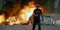 <p>Barricadas se concentram em bairros de classe média, já incomodando moradores opositores</p>  Foto: BBC News Brasil