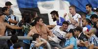 <p>Briga nas arquibancadas da Arena Grêmio pode causar transtornos ao Grêmio</p>  Foto: Wesley Santos / Gazeta Press