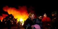 <p>Segundo os balanços oficiais, são 2.500 as casas destruídas pelo incêndio que começou no último sábado</p>  Foto: AFP