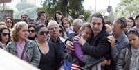 Corpo do menino Bernardo Uglione Boldrini, 11 anos, foi enterrado na manhã desta quarta-feira no Cemitério Municipal de Santa Maria (RS)  junto ao túmulo da mãe, morta em 2010  Foto: Jader Benvegnú / Futura Press