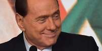 <p>Berlusconi disse que quando dirigia seu império de mídia Fininvest sempre reservava tempo para visitar "todos os sábados" seus empregados doentes ou hospitalizados</p>  Foto: AFP