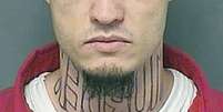 Foto sem data mostra Jeffrey Chapman, acusado de assassinato e sua tatuagem "murder"  Foto: AP