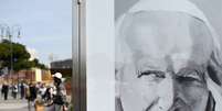 <p>Um retrato de João Paulo II, feito pelo artista polonês Anna Gulak, é parte da exposição "Faces de João Paulo II e João XXIII", em Roma</p>  Foto: AFP