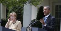 <p>Obama e Merkel participam de coletiva de imprensa conjunta no Jardim das Rosas da Casa Branca, em Washington, neste 2 de maio</p>  Foto: AP