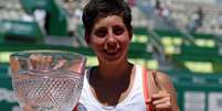 A espanhola Carla Suarez Navarro faturou o primeiro título de WTA na sua carreira  Foto: AFP