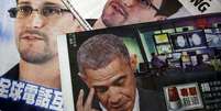 <p>Edward Snowden e o presidente dos EUA, Barack Obama, são impressos nas páginas de local Inglês e jornais chineses em Hong Kong </p>  Foto: Reuters