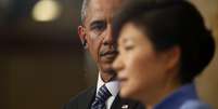 <p>Presidente da Coreia do Sul, Park Geun-hye, é vista sob o olhar de Barack Obama; ela também foi insultada pela mídia norte-coreana </p>  Foto: Reuters