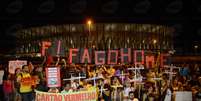 <p>Em Brasília, manifestantes lembraram nove operários mortos nas obras do Mané Garrincha. Ato ocorreu próximo ao estádio</p>  Foto: Fábio Rodrigues Pozzebom / Agência Brasil