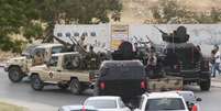 <p>Forças leais a um general líbio atacaram Parlamento do país domingo, ampliando sua ofensiva contra os islamitas na capital do país</p>  Foto: AP