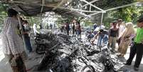 Diversas motos ficaram destruídas após a explosão  Foto: Reuters