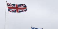 <p>Foto mostra as bandeiras do Reino Unido e da Escócia</p>  Foto: Reuters
