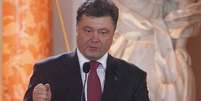 <p>Na foto, Petro Poroshenko discursa durante cerimônia de uma premiação em Varsóvia, Polônia, em 3 de junho</p>  Foto: AP