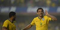 Ap&oacute;s ouvir a torcida pedir por "Lu&iacute;s Fabiano", Fred marca gol e leva uma das m&atilde;os ao ouvido  Foto: Alan Morici / Terra