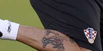 Tatuagem de Bambi no detalhe  Foto: AFP