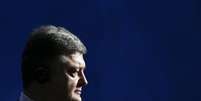 <p>Poroshenko poderia se encontrar com Putin, que assistirá à final da Copa no Maracanã, neste domingo</p>  Foto: Thomas Peter / Reuters