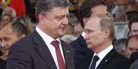 <p>Poroshenko também felicitou Putin pelo Dia da Rússia comemorado nesta quinta-feira</p>  Foto: AFP