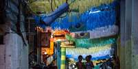 <p>Decorada durante a Copa do Mundo, Favela da Rocinha será uma das comunidades mapeadas pelo projeto</p>  Foto: AFP