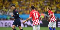 Yuichi Nishimura teve arbitragem polêmica na partida entre Brasil e Croácia  Foto: Getty Images 