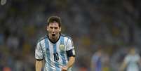 Messi comemora ao marcar o segundo gol argentino na partida contra a Bósnia  Foto: AFP