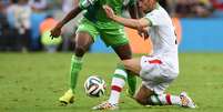 <p>Irã e Nigéria fizeram um jogo muito ruim na Arena da Baixada, em Curitiba</p>  Foto: AFP