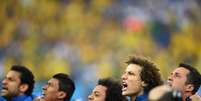 Brasileiros cantam hino em estreia  Foto: Getty Images 