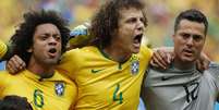 <p>David Luiz cantou alto quando o hino nacional foi cantado à capela no Estádio Castelão, em Fortaleza</p>  Foto: Ricardo Matsukawa  / Terra