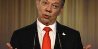 <p>Santos disse que reeleição é prova de que a maioria na Colômbia quer continuação do processo de paz</p>  Foto: AP