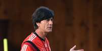 <p>Para o alemão Joachim Löw, times da América estão mais acostumados ao clima das partidas no Brasil</p>  Foto: AFP