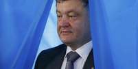 <p>Poroshenko afirmou, nesta quinta-feira, que decidiu assinar o acordo com a União Europeia, ao contrário do que fez seu antecessor, que foi deposto do cargo</p>  Foto: Reuters