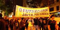 Manifestação no Rio contra a Copa teve pelo menos seis pessoas presas nesta sexta-feira, dia 20  Foto: José Lucena / Futura Press