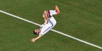 <p>O alemão Klose marca contra Gana, na Arena Castelão, em Fortaleza, e chega aos 15 gols em Copas</p>  Foto: Getty Images 