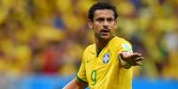 <p>Fred demonstra confiança após marcar o primeiro gol na Copa do Mundo do Brasil</p>  Foto: Getty Images