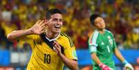 Liderada por James Rodríguez, Colômbia se classificou às oitavas de final da Copa com 9 gols, mas menos finalizações e passes que seus adversários  Foto: Getty Images 
