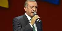 <p>Primeiro-ministro turco Recep Tayyip Erdogan fala para expatriados turcos em um evento para marcar o 10 º aniversário da UETD, a União dos Democratas Europeus turco, no Lanxess Arena, em maio deste ano na Alemanha</p>  Foto: Getty Images 