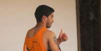 <p>Suárez se emocionou após saber da punição</p>  Foto: Leo Carioca / Reuters