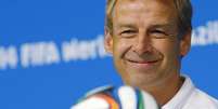 Técnico da seleção dos EUA, Jurgen Klinsmann, sorri durante coletiva de imprensa na Arena Pernambuco, em Recife. 25/06/2014.  Foto: Brian Snyder / Reuters