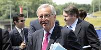 <p>O candidato à presidência da Comissão Europeia, Jean-Claude Juncker, chega à cidade de Courtrai para participar de uma reunião antes de se encontrar com membros da União Europeia, em 26 de junho</p>  Foto: AFP