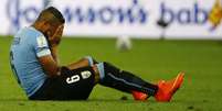 Alvaro Pereira, do Uruguai, reage após tentativa frustrada de gol contra a Colômbia   Foto: Pilar Olivares / Reuters