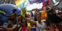 <p>Foliões comemoram a Marcha do Orgulho Gay em Toronto, em 29 de junho</p>  Foto: Mark Blinch / Reuters