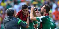 <p>Holanda x México protagonizou a primeira parada técnica oficial da história das Copas</p>  Foto: YURI CORTEZ  / AFP