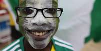 <p>Torcedor até se pintou para apoiar a Nigéria</p>  Foto: Leo Correa / AP