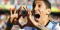 <p>Di María foi premiado com gol que deu classificação à Argentina</p>  Foto: Ivan Alvarado / Reuters