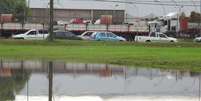 <p>Chuva intensa causou alagamentos no bairro Humaitá, próximo à estação Anchieta, em Porto Alegre nesta sexta-feira</p>  Foto: Daniel Favero / Terra