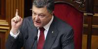 <p>Presidente ucraniano Petro Poroshenko discursa no parlamento em Kiev, em 3 de julho</p>  Foto: Anatolii Stepanov / AFP