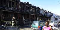 Incêndio em área residencial na Filadélfia causou a morte de quatro crianças e deixou várias pessoas feridas  Foto: AP