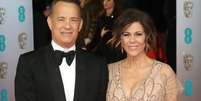 <p>Hanks em foto recente com a mulher, Rita Wilson</p>  Foto: Chris Jackson / Getty Images 