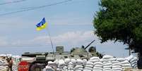 <p>Tropas ucranianas guardam um posto de controle em uma estrada, cerca de 50 km da cidade de Odessa, em 9 de julho</p>  Foto: ALEXEY Kravtsov / AFP