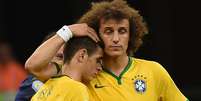 <p>David Luiz foi alvo de críticas do secretário, que elogiou Oscar</p>  Foto: Vanderlei Almeida / AFP