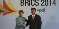 <p>Presidente Dilma Rousseff cumprimenta o presidente chinês Xi Jinping antes de cúpula dos Brics</p>  Foto: Nacho Doce / Reuters